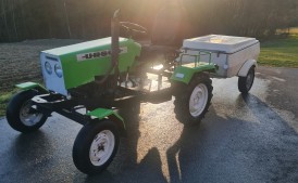 Zielony traktor silnik Fiat 126p